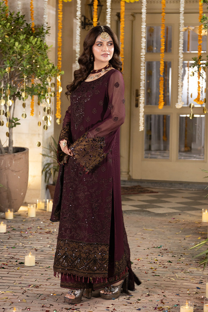 Imrozia Serene M-106 Mahveen 3 piece suit featuring intricate patterns and elegant fabric in a stylish arrangement.