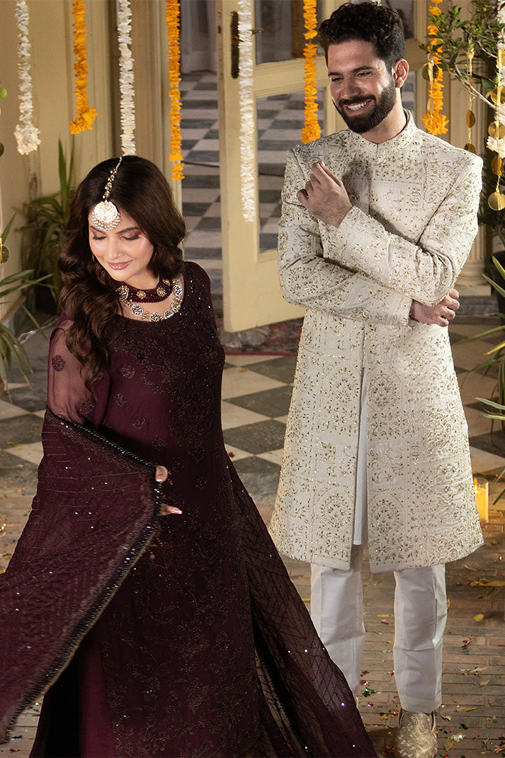 Imrozia Serene M-106 Mahveen 3 piece suit featuring intricate embroidery and elegant fabric draping.