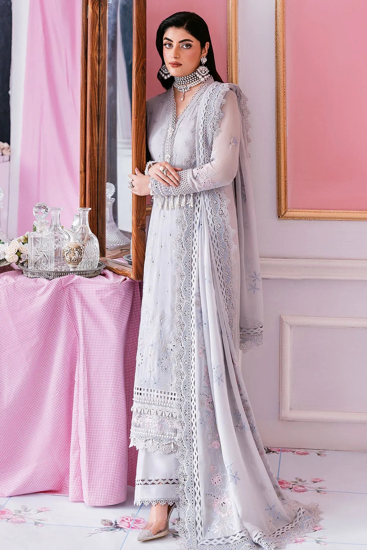 Unstitched Imrozia Serene 3 piece suit in grey, featuring elegant fabric and design, styled flat on a neutral background.